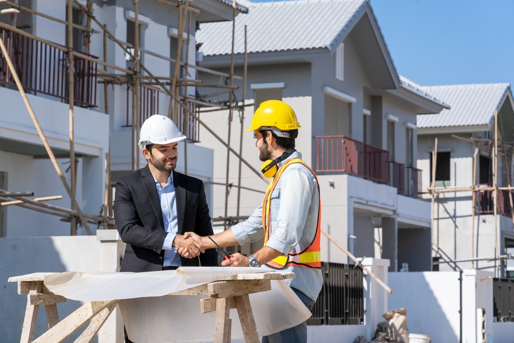 Engineer,Man,Handshake,With,Businessman,After,Finishing,Up,Meeting,In